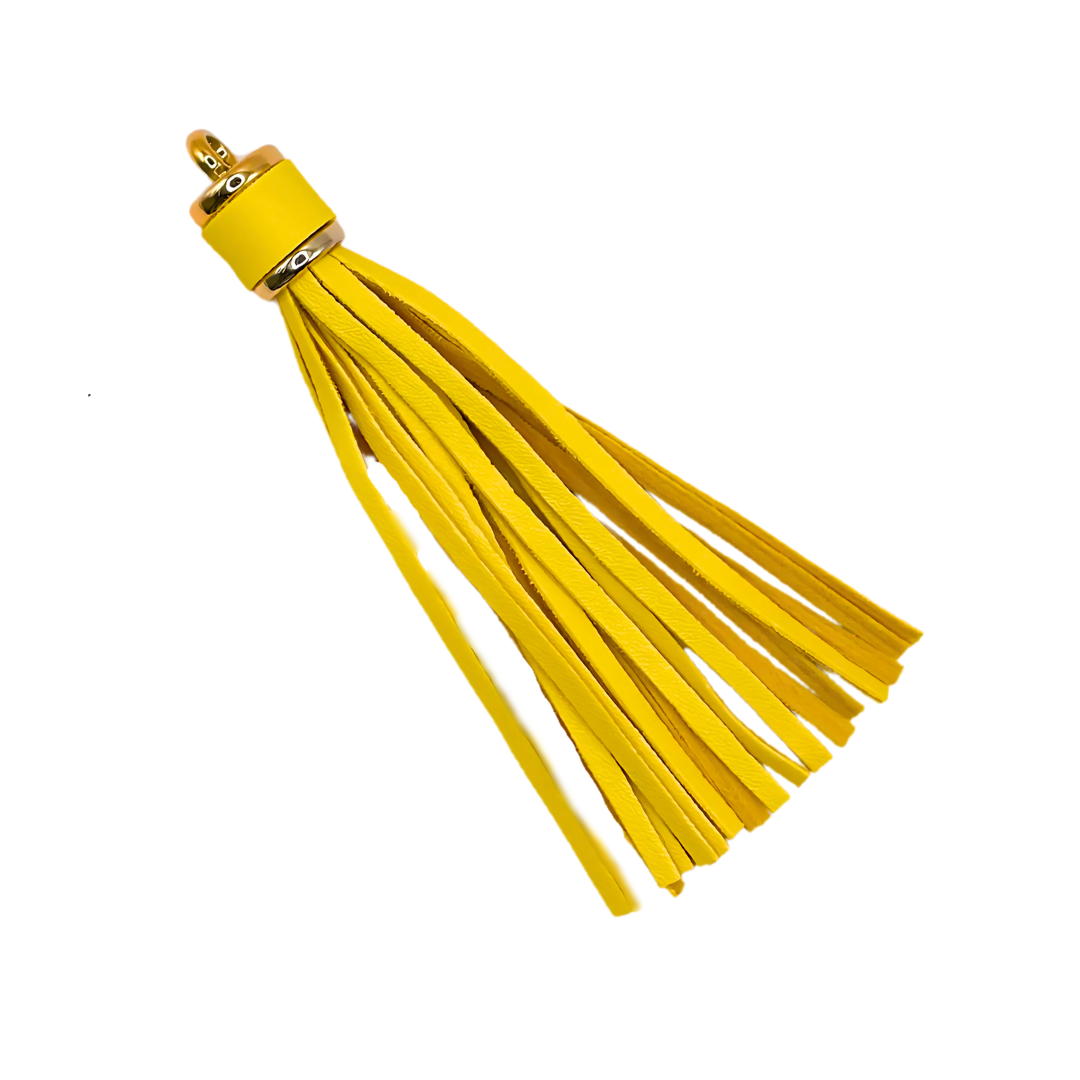 Kwastje groot (tazzle) geel met goud kleur ring