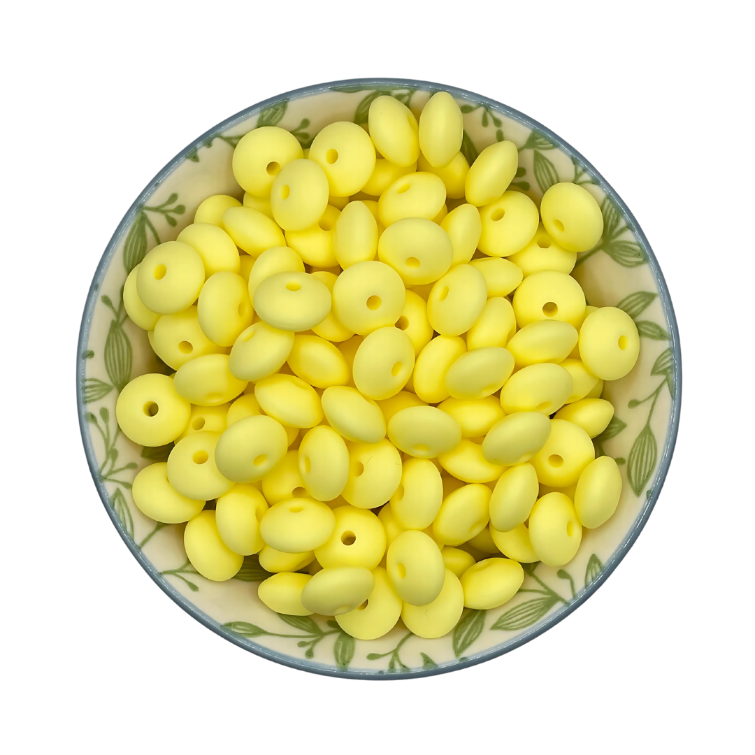 Siliconen kralen tussenschijfjes room geel