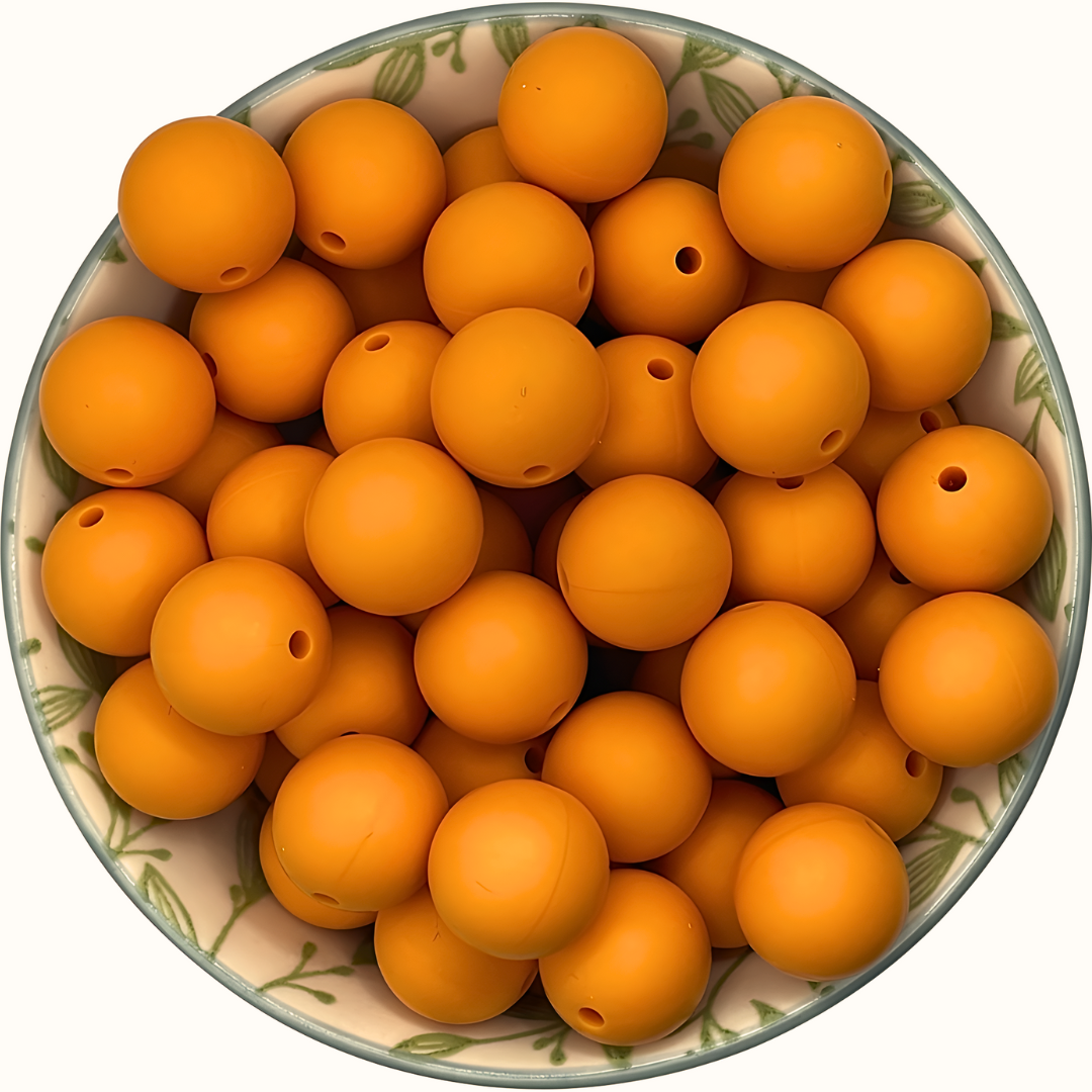 Siliconen kralen 15mm honey gold oranje