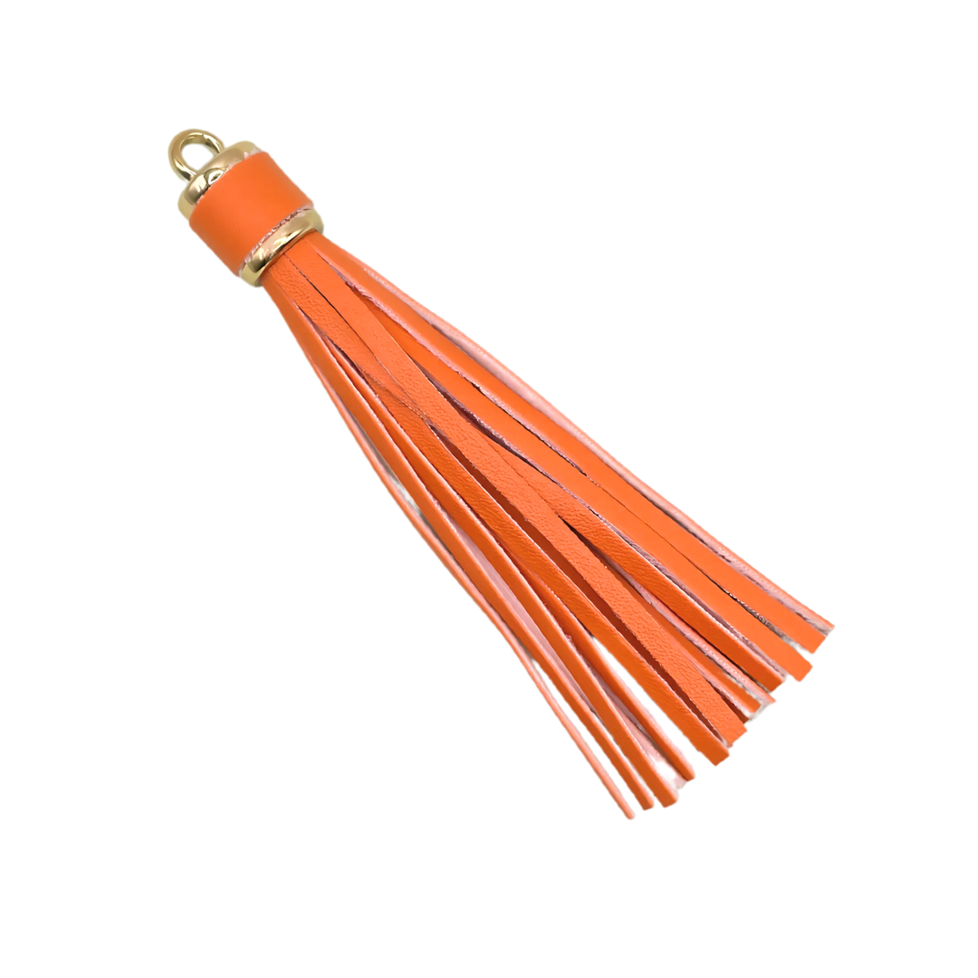 Kwastje groot (tazzle) oranje met goud kleur ring